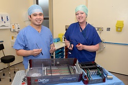 Charge Nurse Francis Millan and Healthcare Assistant Jodie Insley with the tools